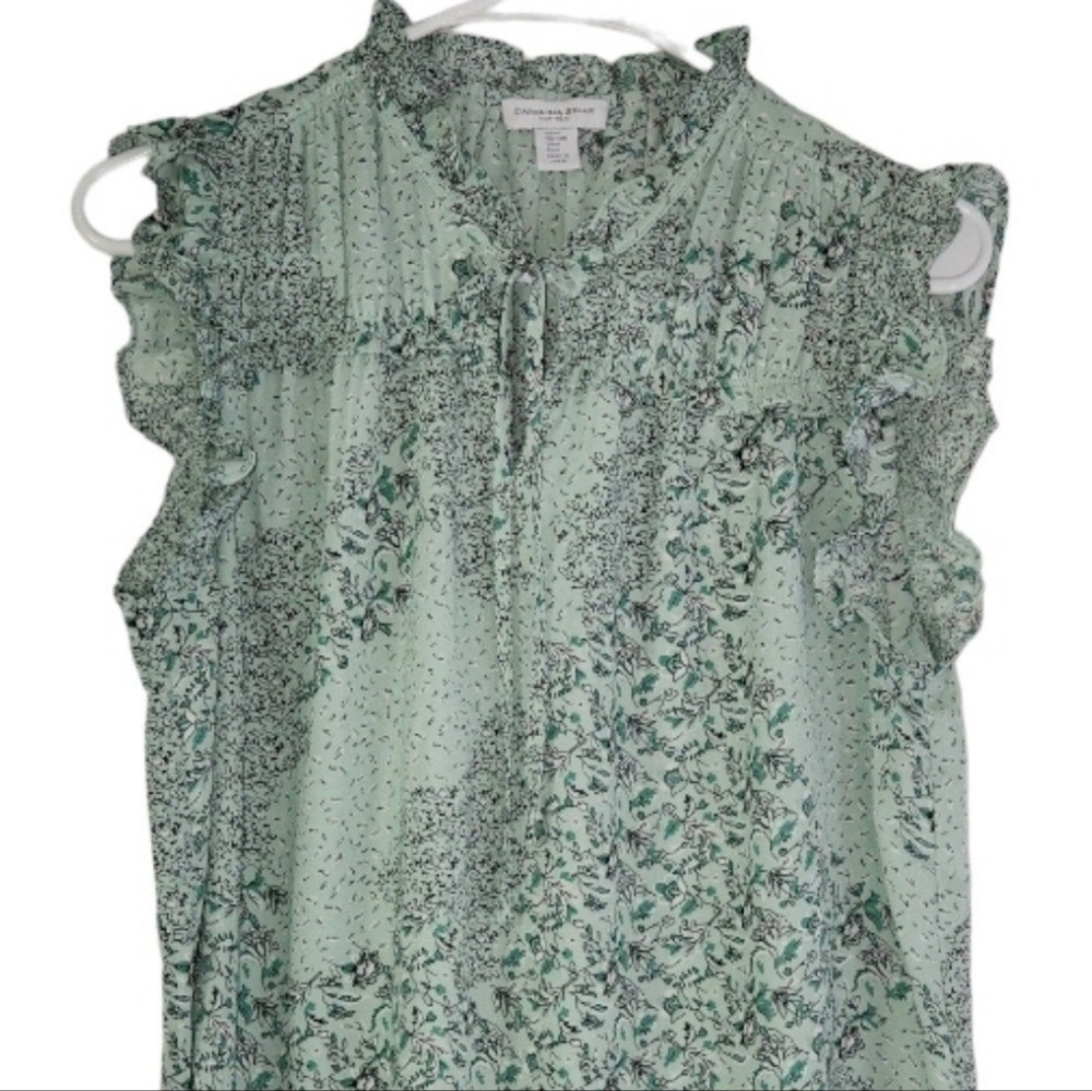 Light green blouse printed with small green flowers